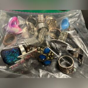 20 costume jewelry rings for craft and some wearables.